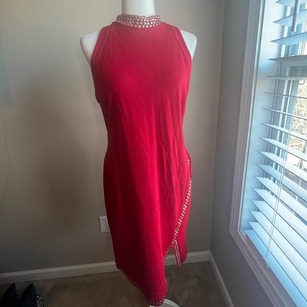 Gorgeous red sleeveless dress trimmed with gold studs